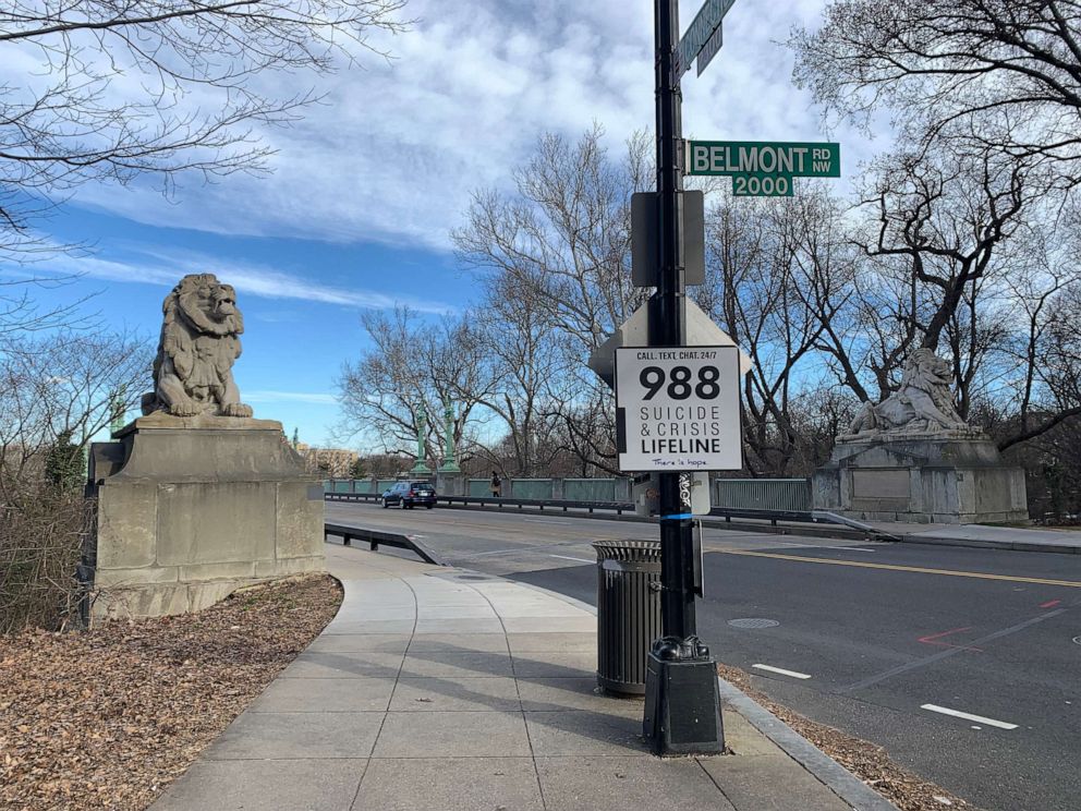 PHOTO: A 988 Suicide & Crisis Lifeline sign at the entrance to Taft Bridge in Washington is photographed on Feb. 10, 2023.