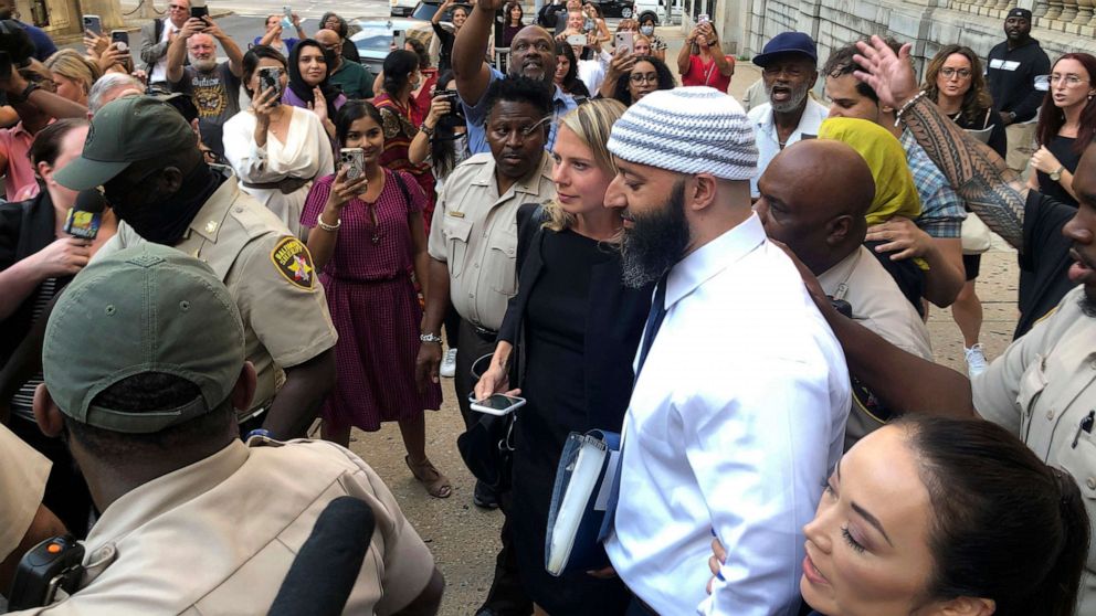 PHOTO: Adnan Syed, center, leaves the Cummings Courthouse on Sept. 19, 2022, in Baltimore.