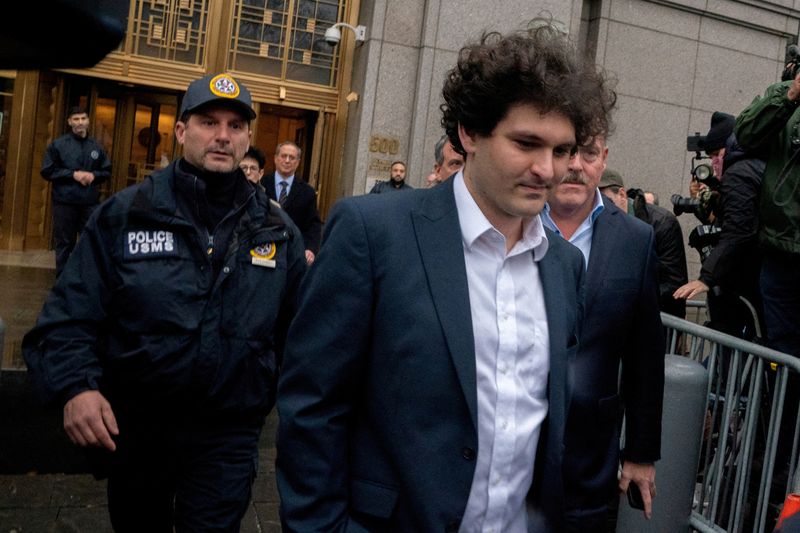 FILE PHOTO: Former FTX Chief Executive Sam Bankman-Fried, who faces fraud charges over the collapse of the bankrupt cryptocurrency exchange, departs from his court hearing at Manhattan federal court in New York City, U.S. January 3, 2023. REUTERS/David Dee Delgado/File Photo