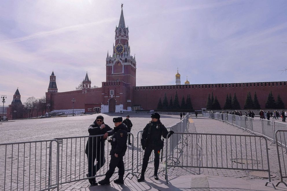 PHOTO: Law enforcement officers stand guard next to barrier constructions installed near the Kremlin before the planned talks of Russian President Vladimir Putin and Chinese President Xi Jinping in Moscow, Russia, March 20, 2023.