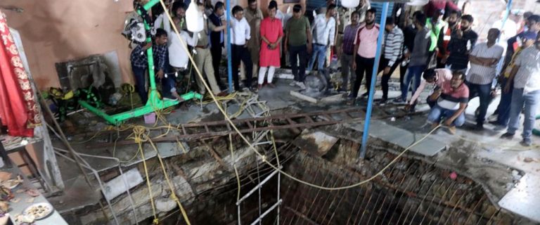 Covering over well at Indian temple collapses, killing 35