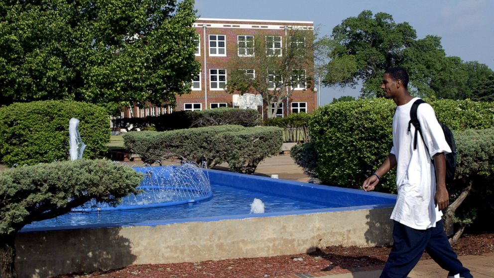 PHOTO: A student walks across the Langston University campus in Langston, Okla., April 21, 2005.