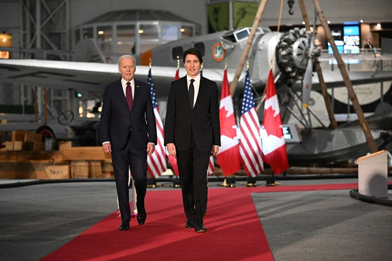 US President Joe Biden and Canada's Prime Minister Justin Trudeau arrive to attend a gala dinner hosted Justin Trudeau and his wife Sophie Gregoire Trudeau at the Canadian Aviation and Space Museum in Ottawa, Canada, on March 24, 2023. (Photo by Mandel NGAN / AFP) (Photo by MANDEL NGAN/AFP via Getty Images)