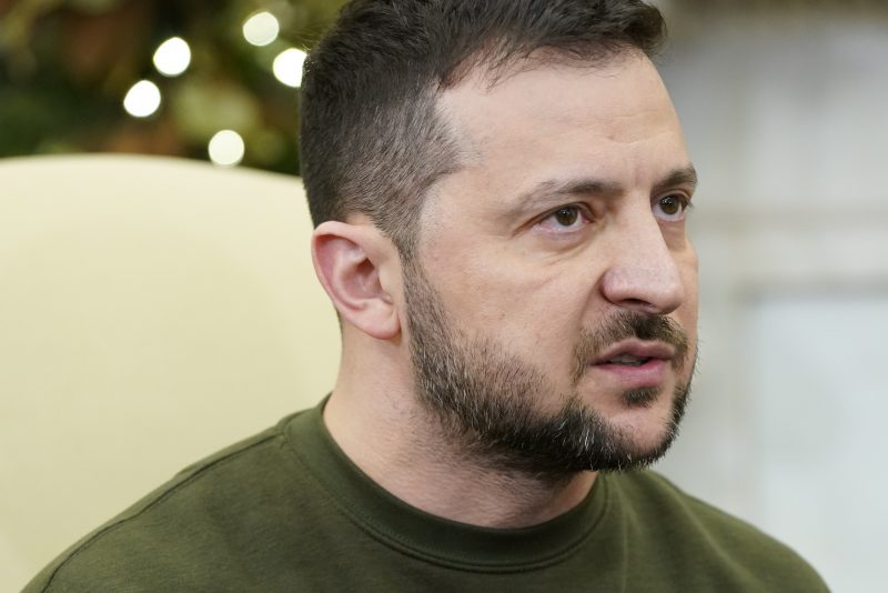 Ukrainian President Volodymyr Zelenskyy speaks during a meeting with President Joe Biden in the Oval Office of the White House, Wednesday, Dec. 21, 2022, in Washington. (AP Photo/Patrick Semansky)