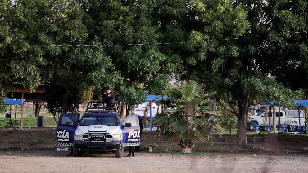 PHOTO: Authorities work at a crime scene where gunmen killed several people including a minor after storming a water park, in Cortazar, Guanajuato state, Mexico April 15, 2023.