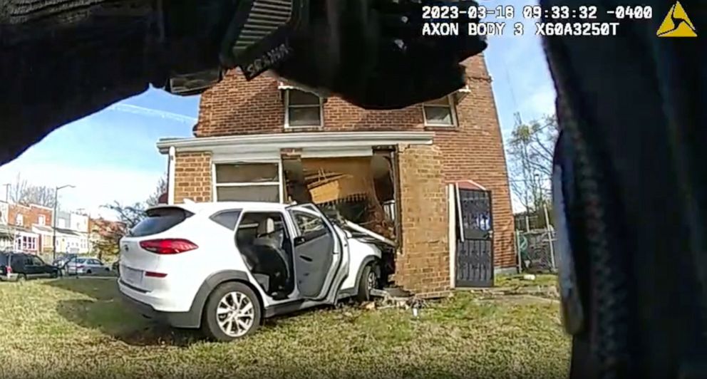 PHOTO: Body camera footage shows a vehicle that crashed into a house after an office shot the driver, in Washington, D.C., on March 18, 2023.