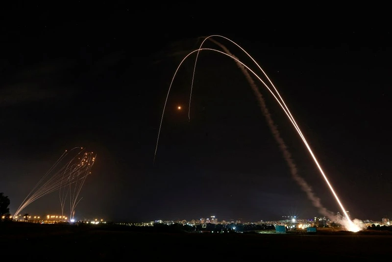 TOPSHOT - Israel's Iron Dome aerial defence system is launched to intercept a rocket launched from the Gaza Strip, controlled by the Palestinian Hamas movement, above the southern Israeli city of Ashdod, on May 11, 2021. (Photo by Menahem KAHANA / AFP) (Photo by MENAHEM KAHANA/AFP via Getty Images)