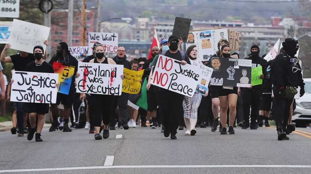 PHOTO: Justice for Jayland Walker protesters march along East Exchange Street on April 14, 2023 in Akron, Ohio.