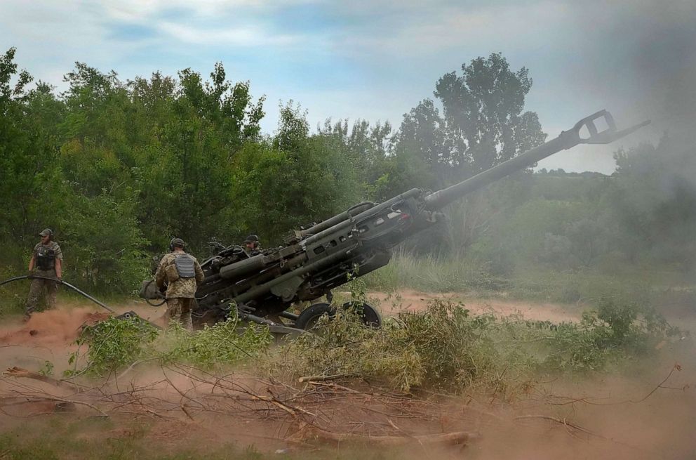 PHOTO: Ukrainian soldiers fire at Russian positions from a U.S.-supplied M777 howitzer in Ukraine's eastern Donetsk region, June 18, 2022.
