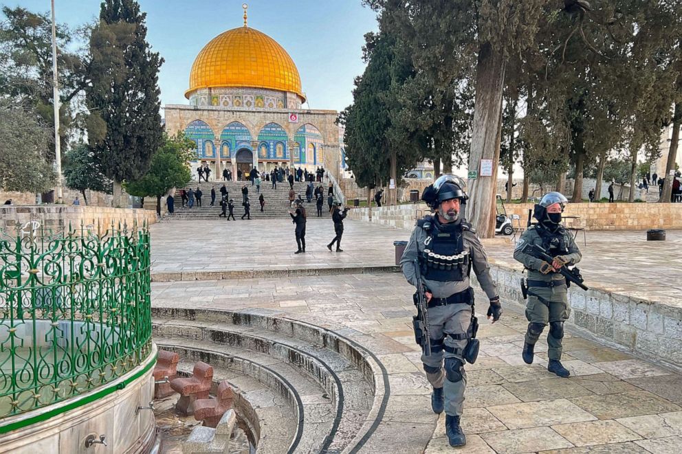 PHOTO: Israeli police walk inside the Al-Aqsa mosque compound in Jerusalem, early on April 5, 2023, after clashes erupted during Islam's holy month of Ramadan.