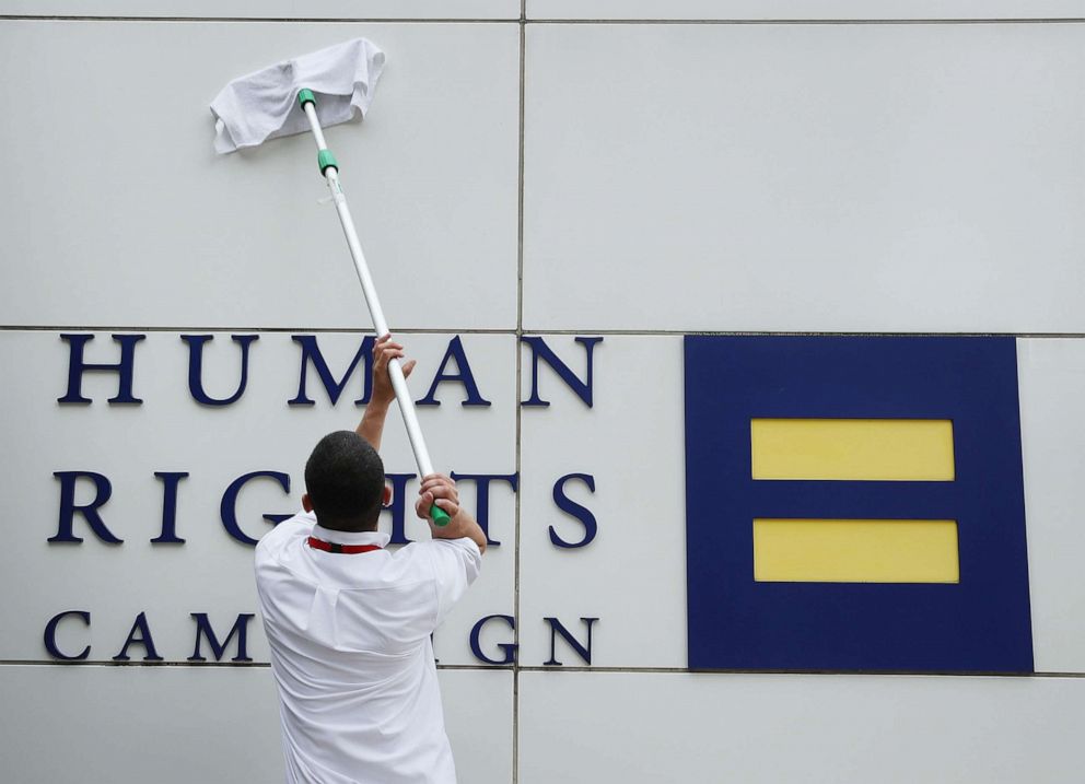 PHOTO: A worker cleans the wall of the Human Rights Campaign building, June 17, 2016, in Washington, D.C.