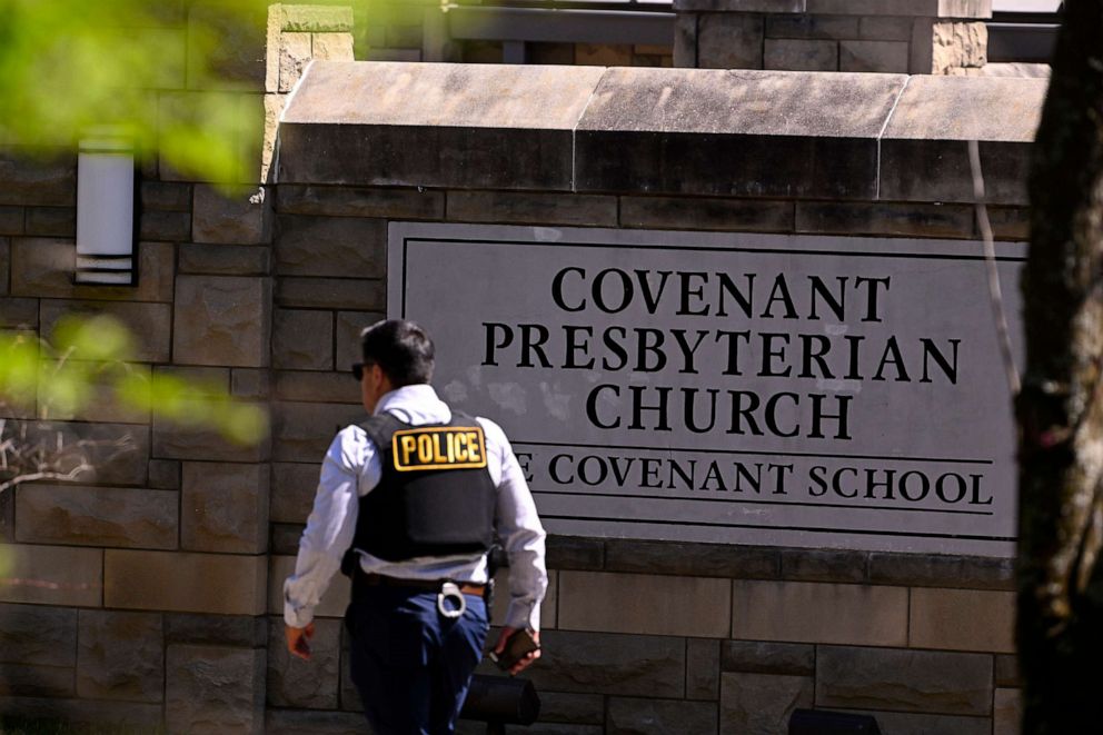 PHOTO: A police officer walks by an entrance to The Covenant School after a shooting, March 27, 2023, in Nashville, Tenn.