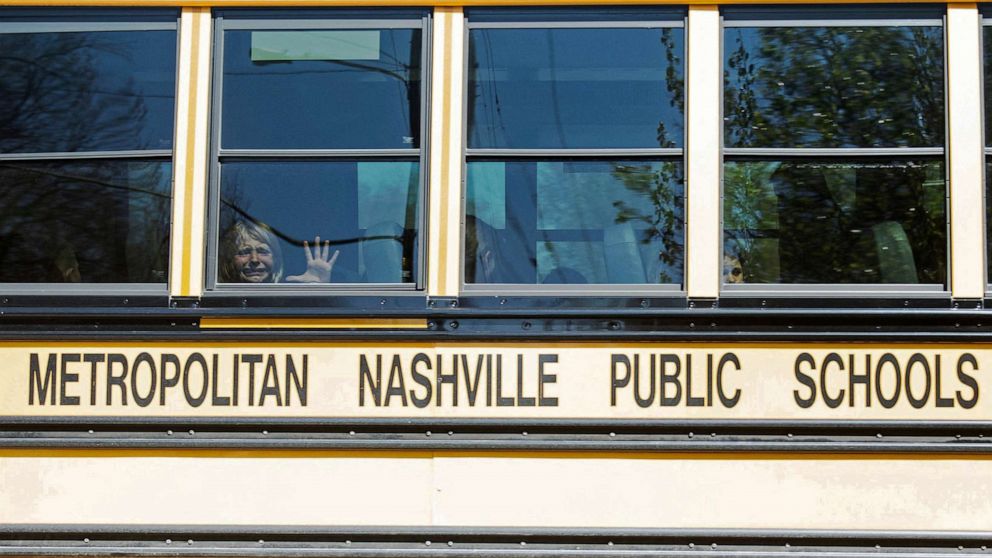 PHOTO: A child weeps while on a bus leaving The Covenant School, following a mass shooting at the school in Nashville, Tenn., Mar. 27, 2023.