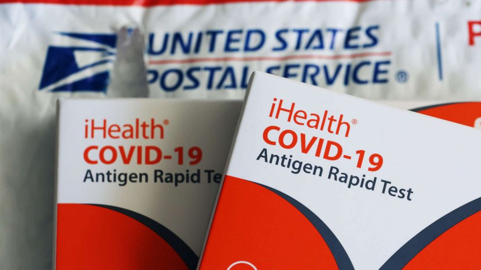 PHOTO: Free iHealth COVID-19 antigen rapid tests from the federal government sit on a U.S. Postal Service envelope after being delivered on Feb. 04, 2022 in San Anselmo, Calif.