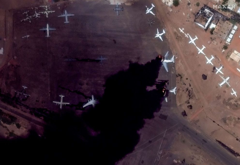 PHOTO: Satellite image shows burning IL-76 candid airplanes at Khartoum International Airport in Khartoum, Sudan, on April 16, 2023.