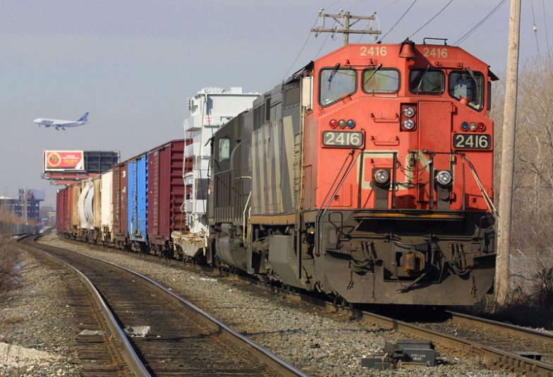 A Canadian National freight train idles on Wisconsin Central railroad tracks near Rosemont, IL. as it waits February 1, 2001 for an approach signal. Canadian National Railway Co. has reached a deal to buy Wisconsin Central Transportation Corp., for $800 million in cash. Wisconsin Central, based in Rosemont, IL., has 2,850 miles of track and track rights in Wisconsin, Illinois, Minnesota, Michigan's Upper Peninsula, and Ontario. The deal announced January 30, 2001 would "secure a link" connecting Chicago and Superior, Wis., to Canadian National's network across Canada, Canadian National said. The rail industry in the United States had been going through a whirlwind of consolidations, some of which created severe traffic disruptions. Last year, U.S. regulatory authorities rejected Canadian National's plan to merge with Burlington Northern Santa Fe railway to create North America's largest rail company in a deal worth $6.2 billion. (Photo by Tim Boyle/Newsmakers)