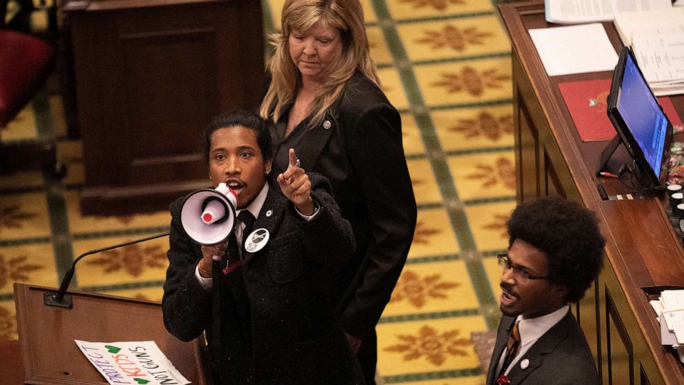 PHOTO: Tennessee State Representative Justin Jones, Rep. Justin Pearson and Rep. Gloria Johnson, call on their colleagues to pass gun control legislation from the well of the House Chambers at the State Capitol, March 30, 2023, in Nashville, Tenn.