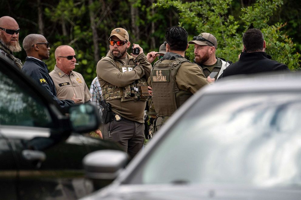 PHOTO: Law enforcement search for the suspect a few miles from the scene where five people, including an 8-year-old child, were killed after a shooting inside a home, April 29, 2023 in Cleveland, Texas.