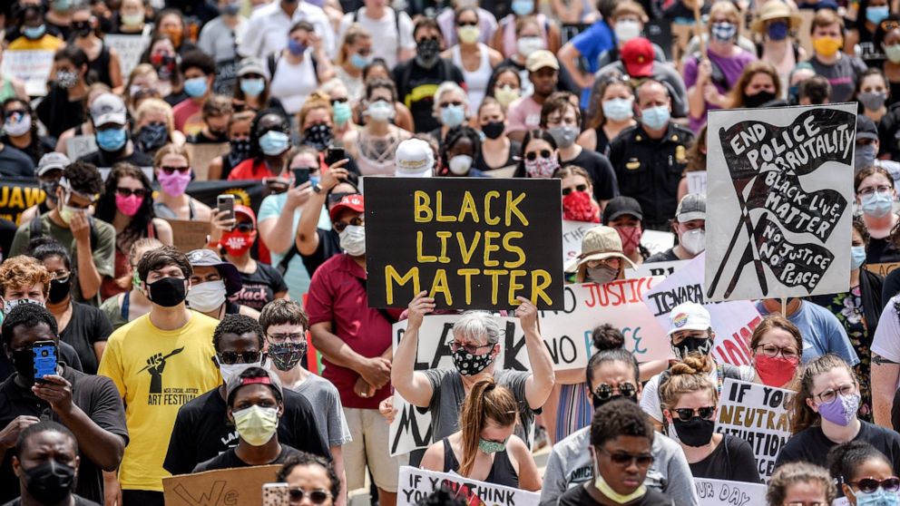 PHOTO: In this June 10, 2020 file photo demonstrators gather at the Michigan State Capitol in Lansing, Mich.