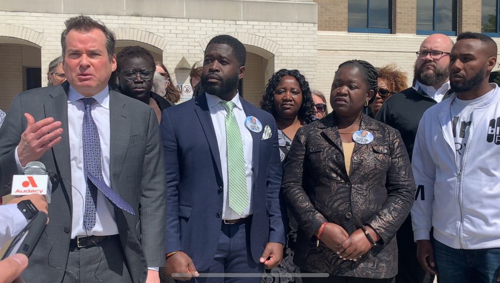 PHOTO: Outside of the Dinwiddie Courthouse with Family Lawyer Mark Krudys, Otieno's brother Leon Ochieng and mother Caroline Ouko, BLM RVA CEO Lawrence West.