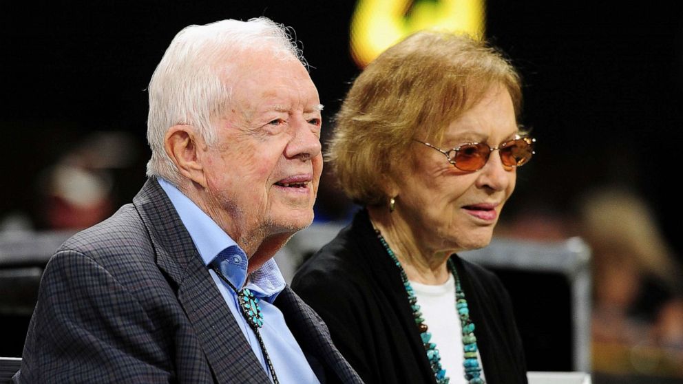 PHOTO: FILE - Former president Jimmy Carter and his wife Rosalynn prior to a game at Mercedes-Benz Stadium, Sept. 30, 2018 in Atlanta.