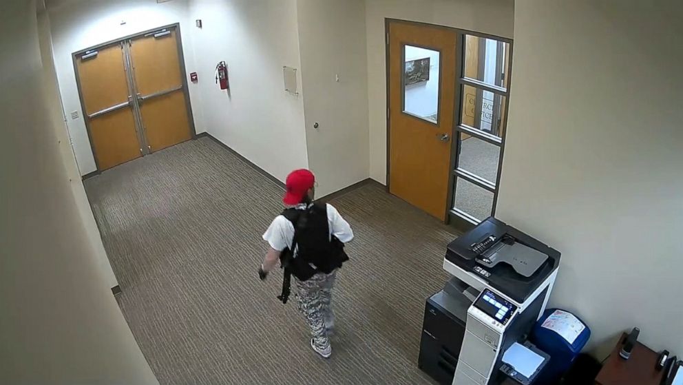 PHOTO: A still image from surveillance video shows what the Metropolitan Nashville Police Department describe as mass shooting suspect Audrey Elizabeth Hale, 28, inside The Covenant School carrying weapons in Nashville, Tenn., March 27, 2023.