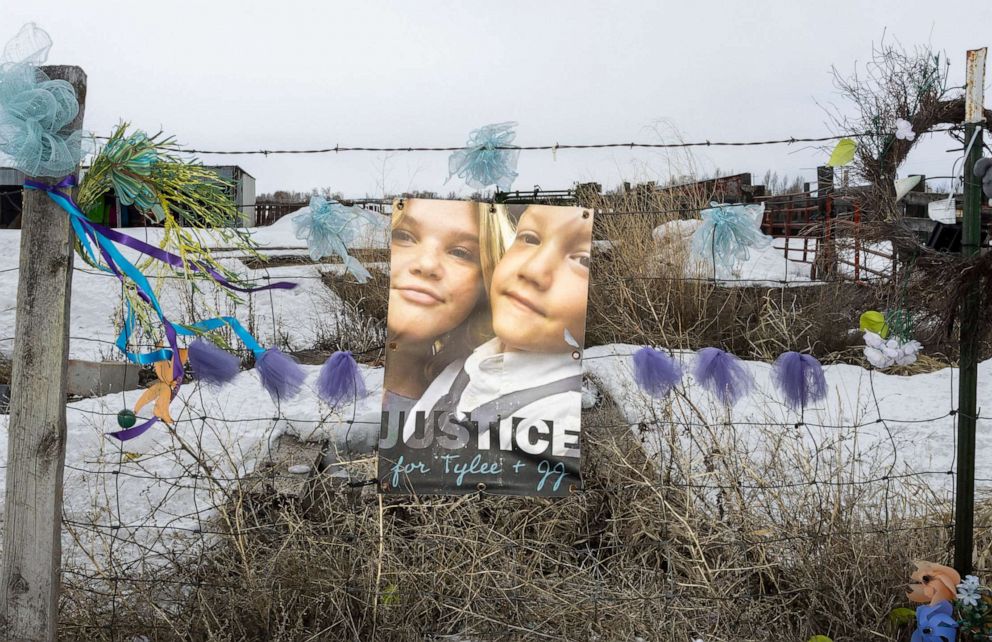 PHOTO: A picture of Tylee Ryan and J.J. Vallow is seen on a fence opposite the property where their bodies were found in 2020, on April 4, 2023 in Rexburg, Idaho.