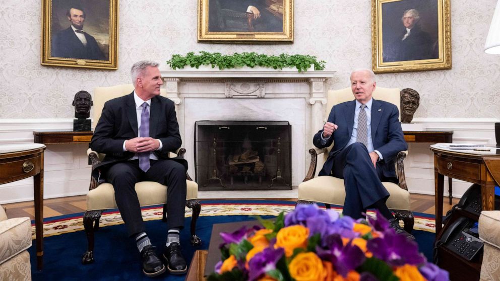 PHOTO: House Speaker Kevin McCarthy listens as President Joe Biden speaks during a meeting on the debt ceiling, in the Oval Office of the White House in Washington, May 22, 2023.