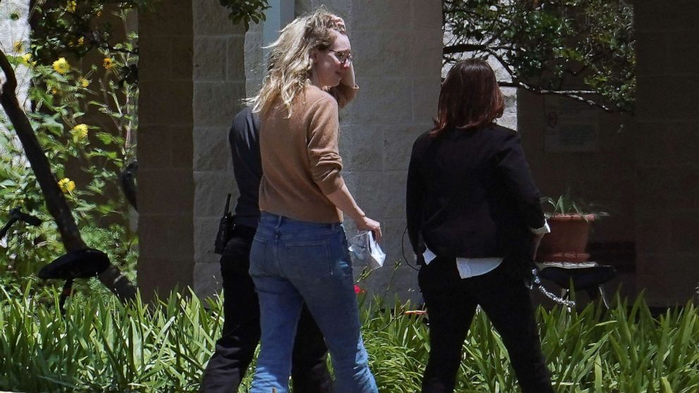 PHOTO: Theranos founder Elizabeth Holmes arrives to begin serving her prison sentence for defrauding investors in the failed blood-testing startup, at the Federal Prison Camp in Bryan, Texas, May 30, 2023.