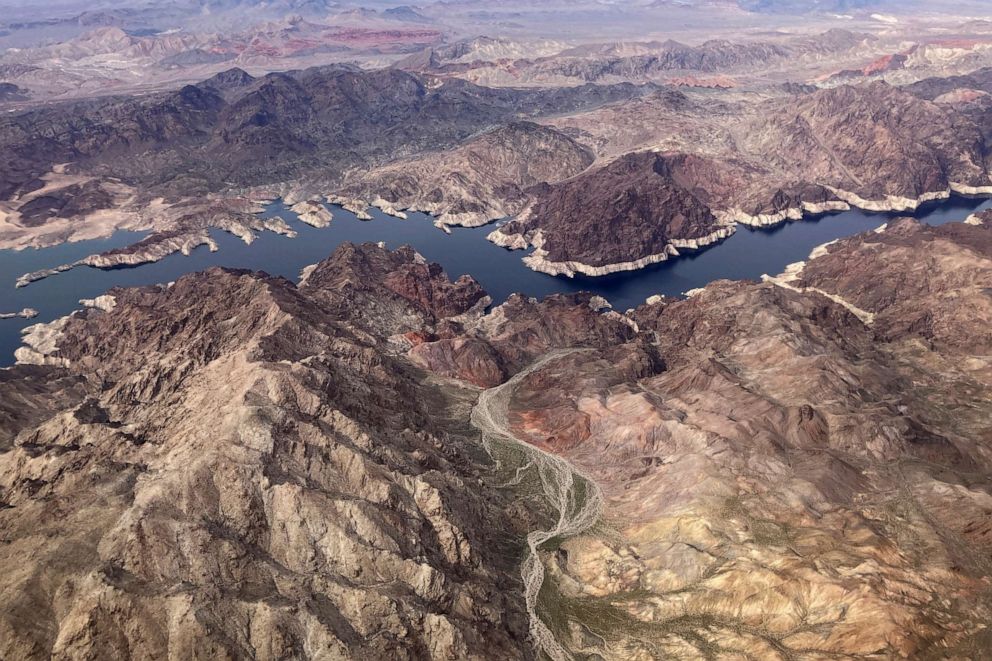 PHOTO: A bathtub ring shows where the water mark on Lake Mead once was along the boarder of Nevada and Arizona, March 6, 2023, near Boulder City, Nev.