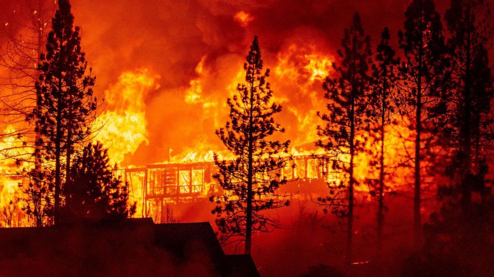 PHOTO: In this Sept. 8, 2020, file photo, a home is engulfed in flames during the "Creek Fire" in the Tollhouse area of unincorporated Fresno County, Calif.