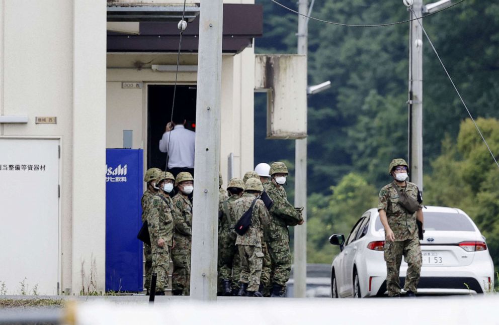PHOTO: Members of the Japanese Self-Defence Force are seen around the shooting range, in which a teenage member of SDF was arrested on suspicion of attempted murder after a shooting incident, in Gifu, Gifu Prefecture, Japan June 14, 2023.
