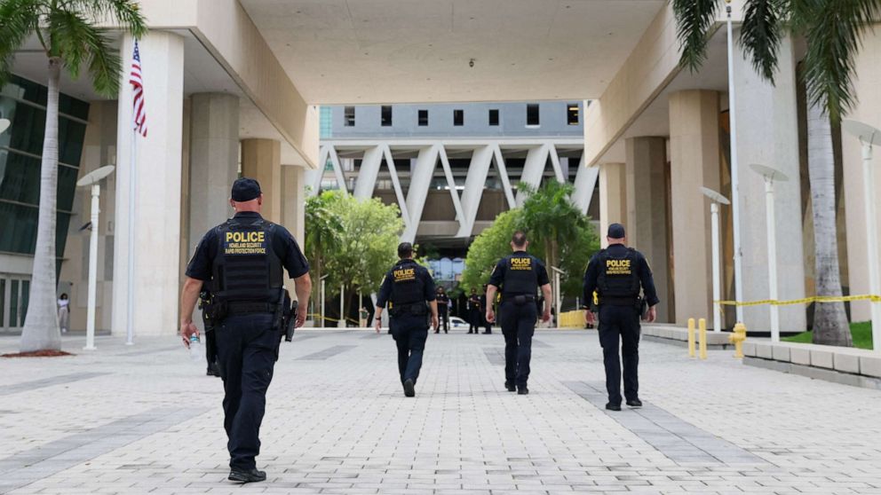 PHOTO: Homeland Security Police officers patrol outside of The Wilkie D. Ferguson Jr. United States Courthouse, ahead of former President Donald Trump's appearance there on classified document charges in Miami, June 12, 2023.