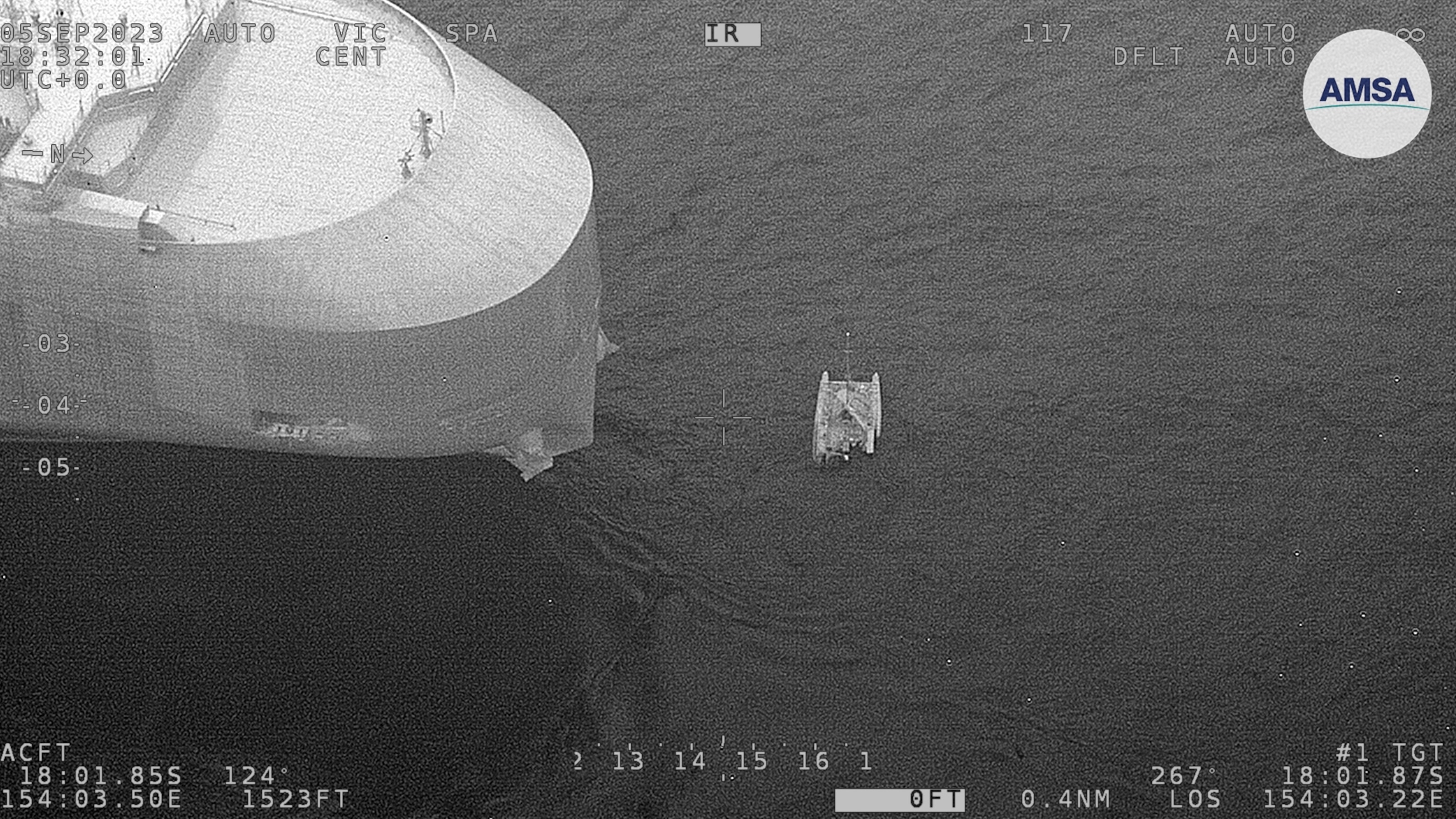 PHOTO: A 9-meter inflatable catamaran Tion with three passengers that was rescued in the coral sea Australian Maritime Safety Authority