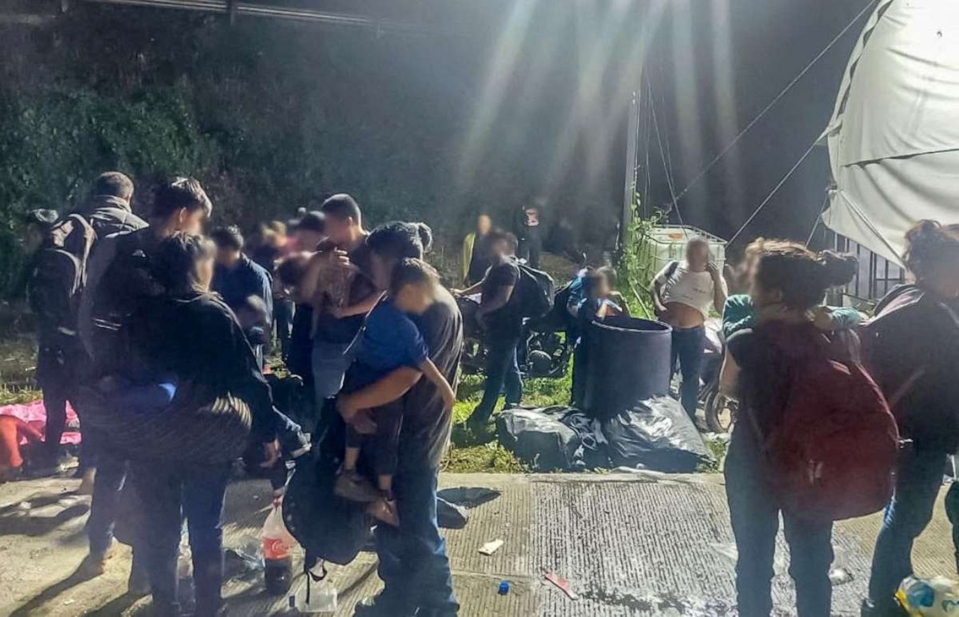 PHOTO: Migrants are rescued by Mexican authorities after being found crammed and dehydrated in a trailer-truck, in Cosamaloapan, in Veracruz state, Mexico, in this handout photo distributed to Reuters on September 14, 2023.