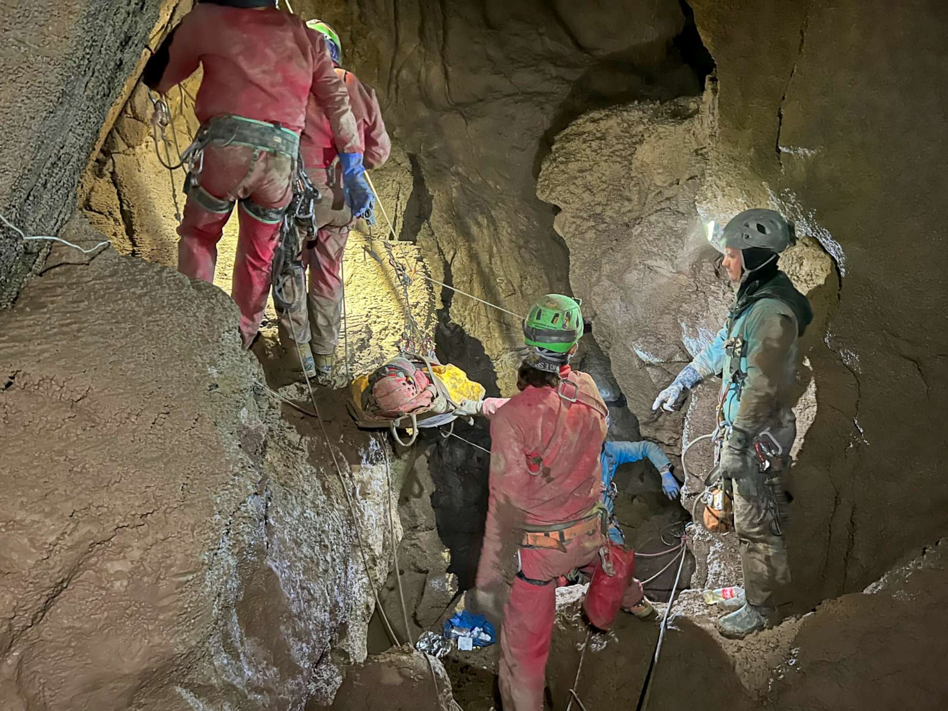 PHOTO: Members of the CNSAS, Italian alpine and speleological rescuers, carry a stretcher with American researcher Mark Dickey during a rescue operation in the Morca cave, near Anamur, southern Turkey, Sept. 11, 2023.