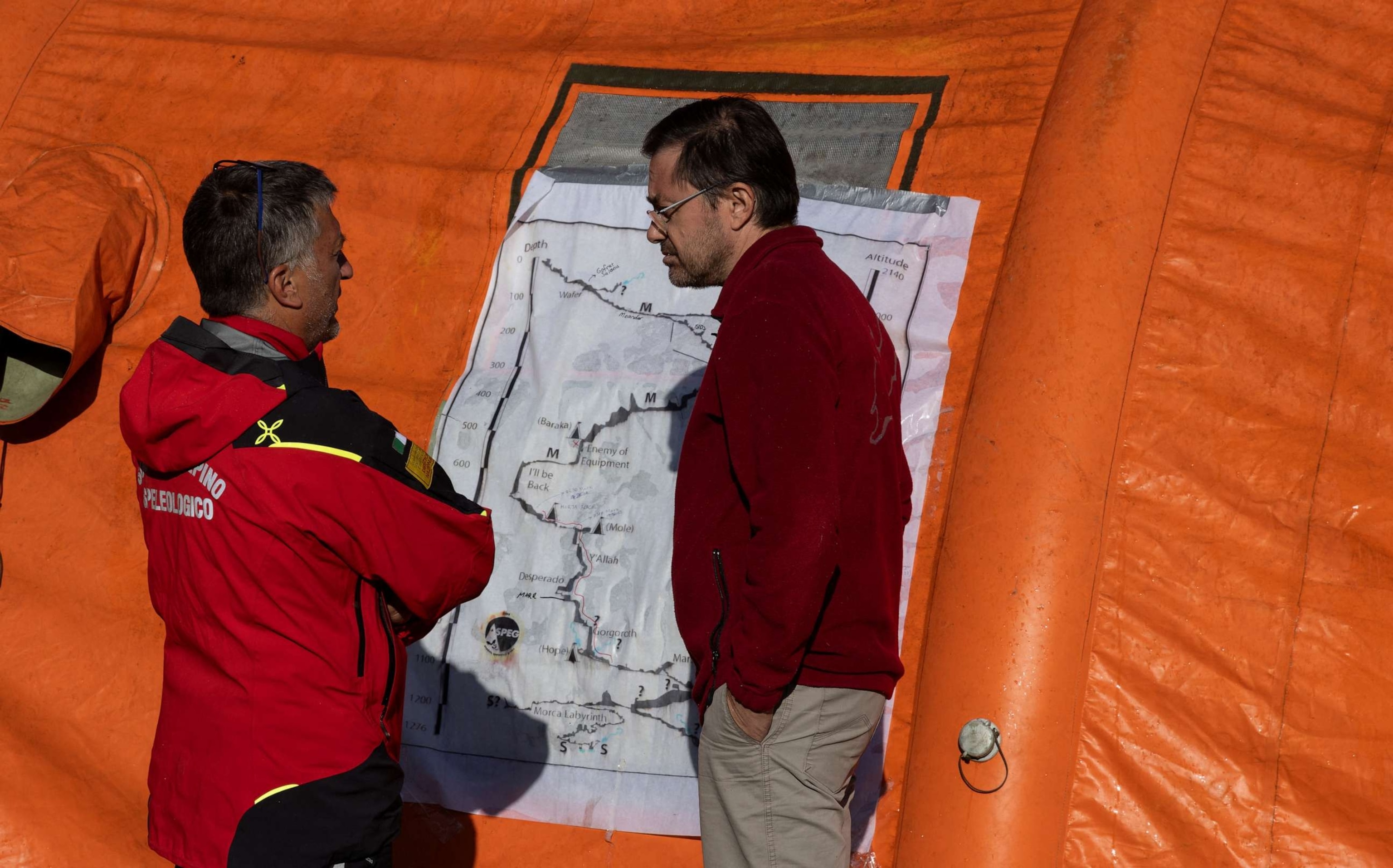 PHOTO: Chairperson of ECRA Technical Commission Giuseppe Conti and Head of Turkey's Caving Federation Bulent Genc work on a map as they take part in a rescue operation for Mark Dickey near Anamur in Mersin province, southern Turkey, Sept. 10, 2023.