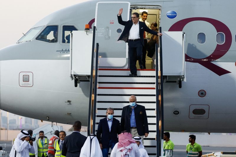 US citizens Siamak Namazi (C-back), Emad Sharqi (bottom-L) and Morad Tahbaz (bottom-R) disembark from a Qatari jet upon their arrival at the Doha International Airport in Doha on September 18, 2023. (Photo by KARIM JAAFAR/AFP via Getty Images)