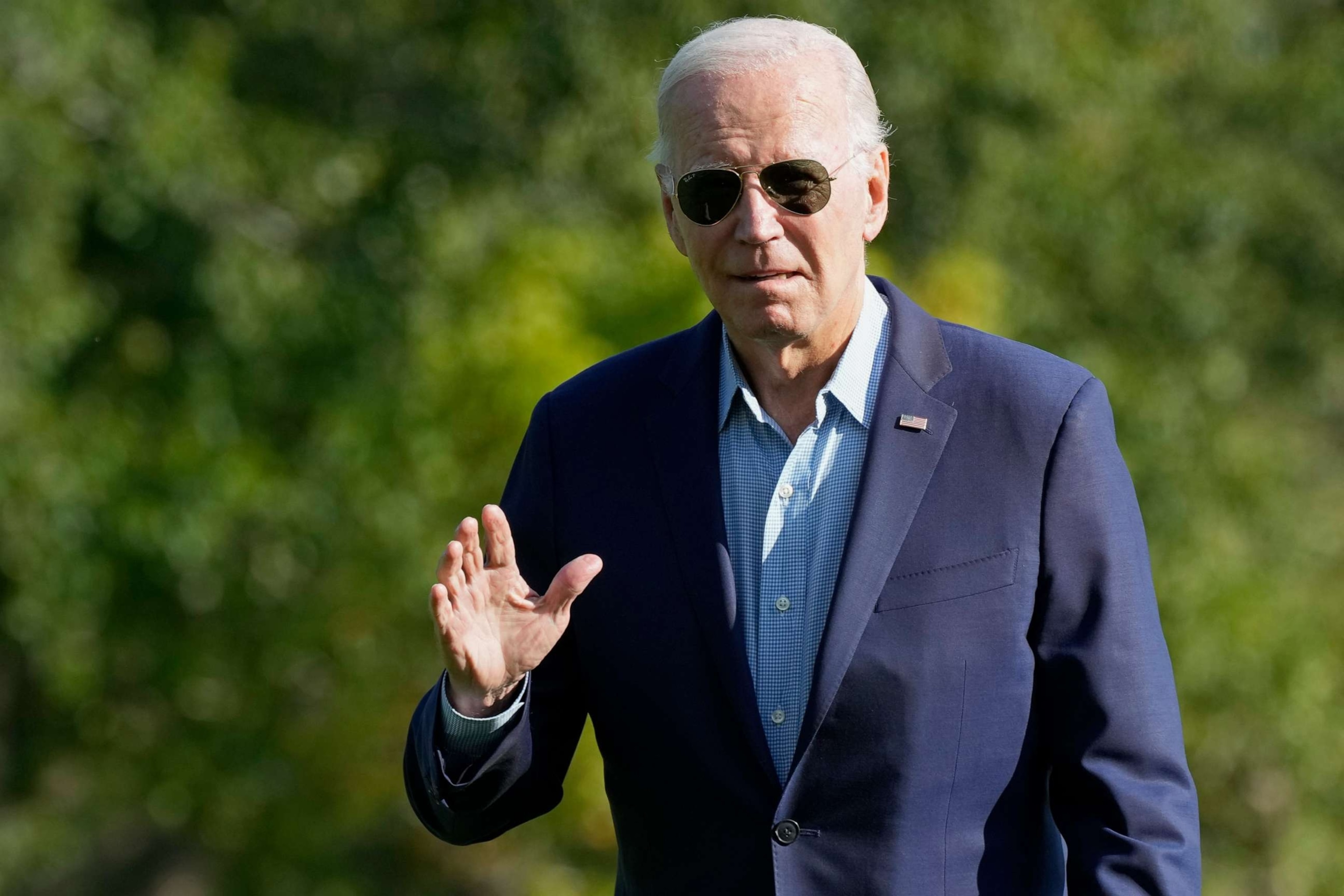 PHOTO: President Joe Biden waves as he walks on the South Lawn as he arrives at the White House, Sep. 4, 2023, in Washington.