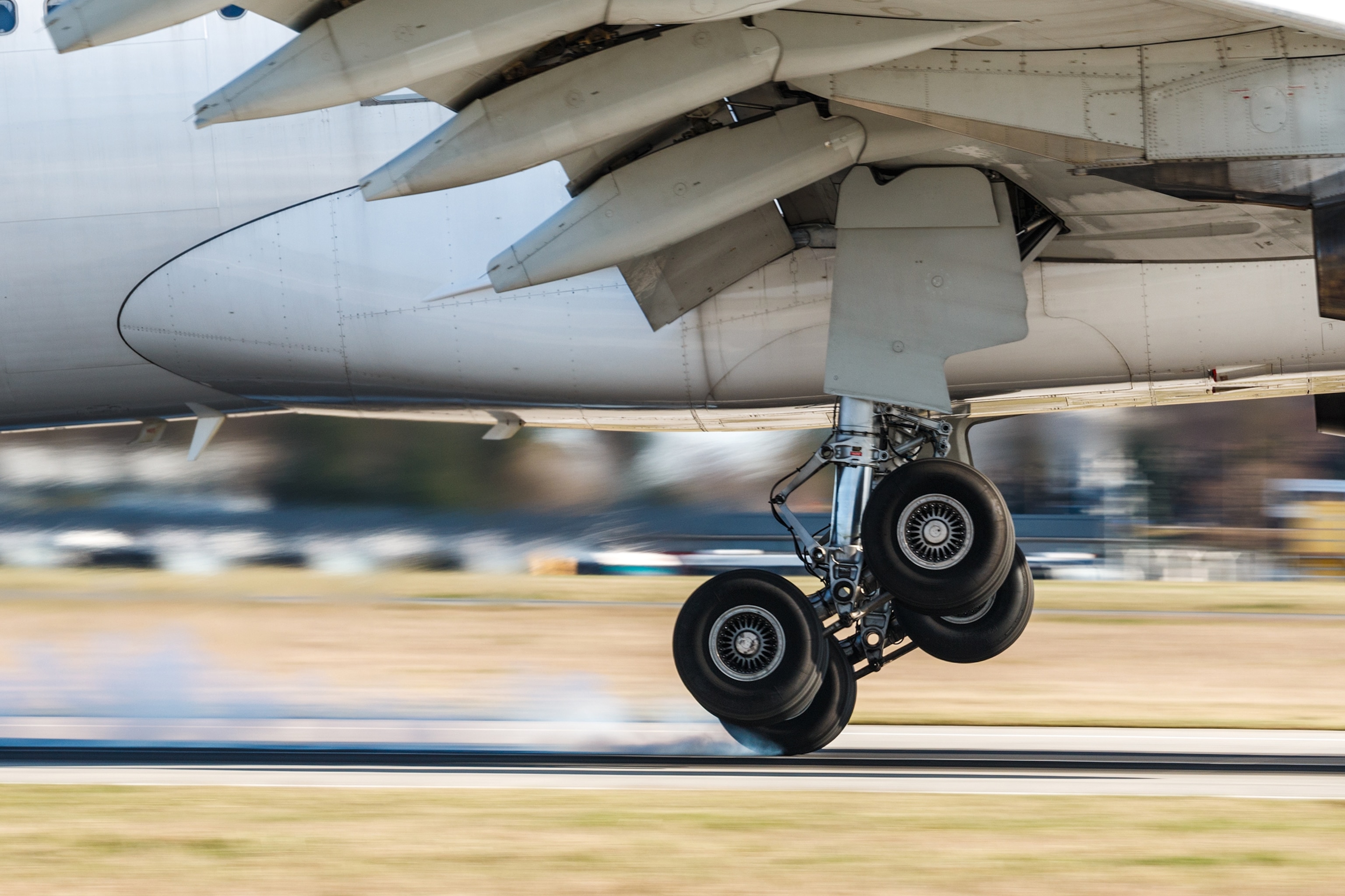 PHOTO: In an undated stock photo, the landing gear of an airplane is shown during touchdown.