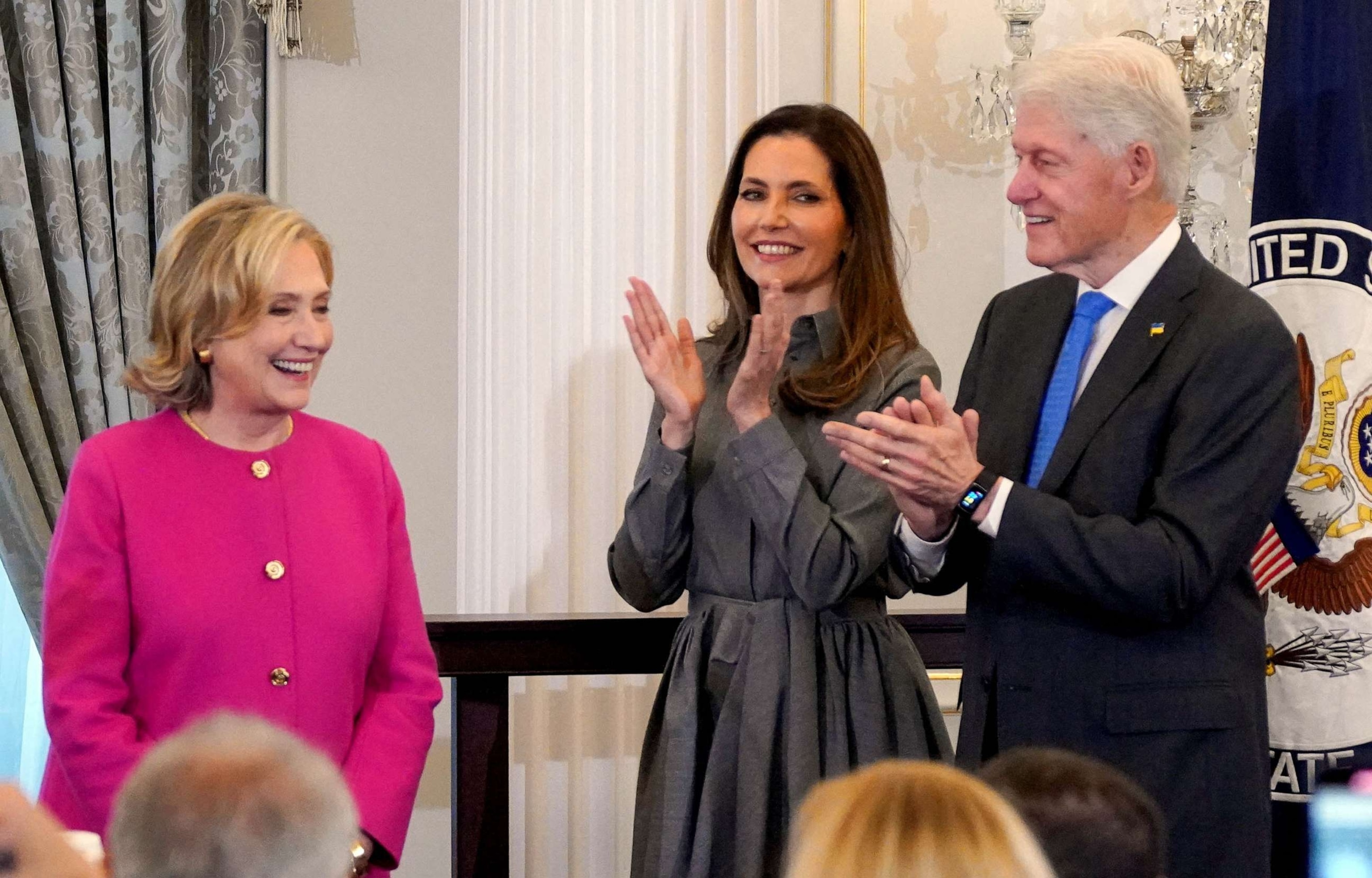 PHOTO: Secretary of State Antony Blinken's wife Evan Ryan and former U.S. President Bill Clinton congratulate former U.S. Secretary of State Hillary Rodham Clinton during the unveiling of her portrait, at the State Department in Washington, Sept. 26, 2023