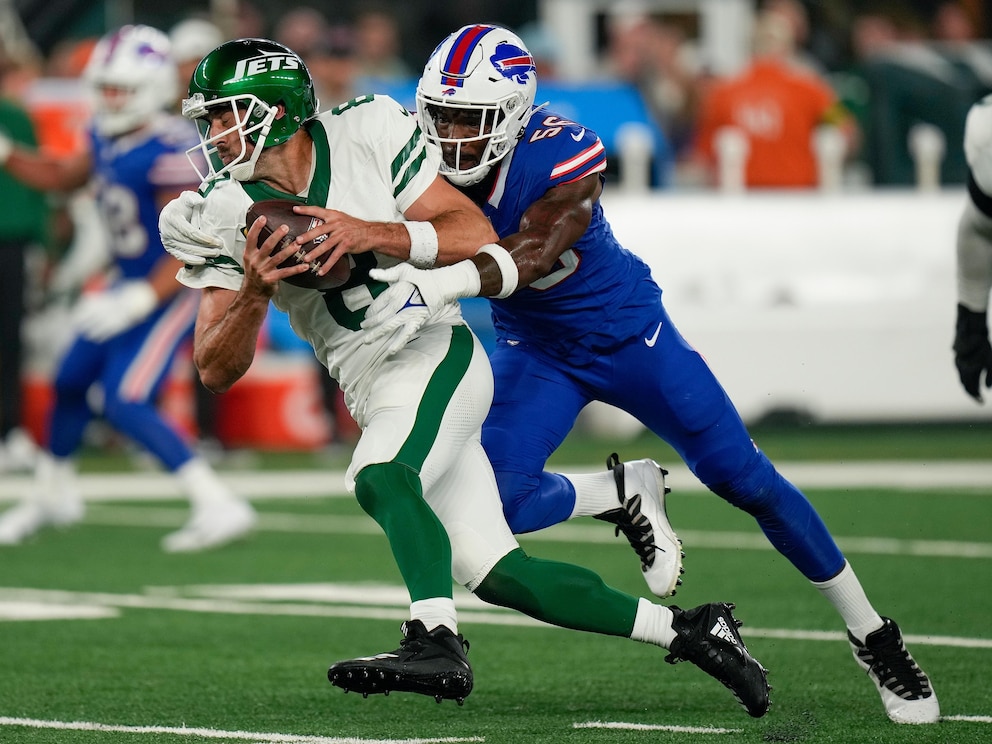 New York Jets quarterback Aaron Rodgers (8) is sacked by Buffalo Bills defensive end Leonard Floyd (56) during the first quarter of an NFL football game, Monday, Sept. 11, 2023, in East Rutherford, N.J. (AP Photo/Seth Wenig)