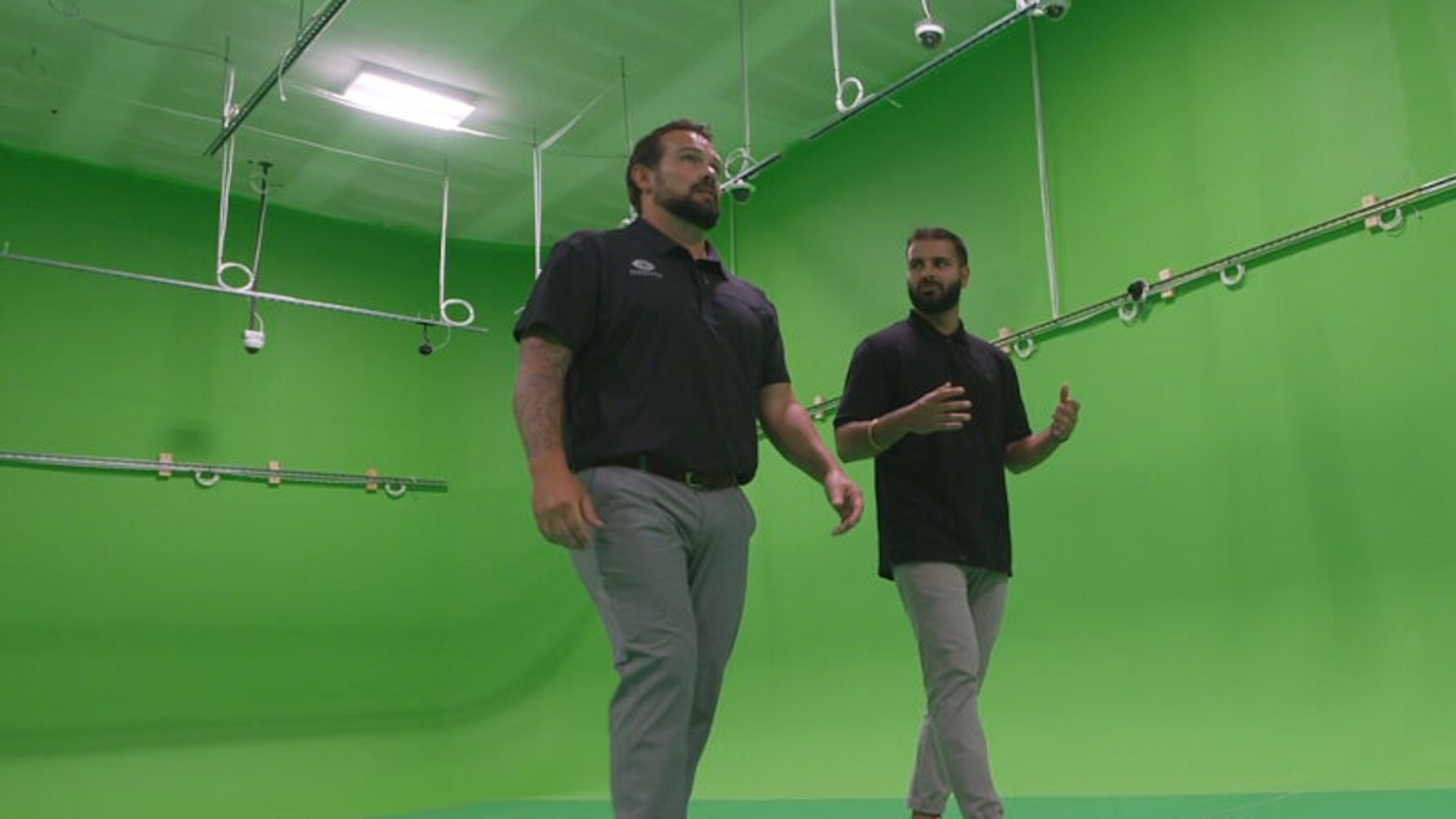 PHOTO: Artificial intelligence is only as good as the data used to teach the machine. ZeroEyes has created a green screen room to train their AI to spot guns.