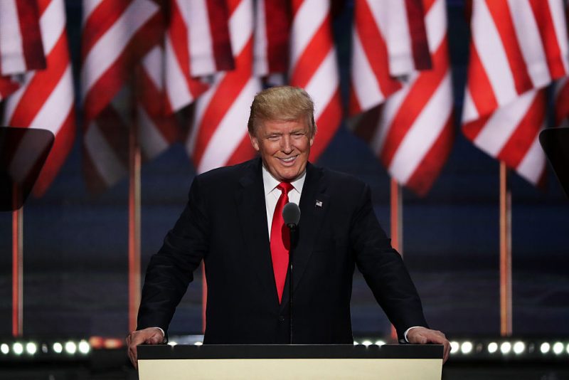 CLEVELAND, OH - JULY 21: Republican presidential candidate Donald Trump acknowledges the crowd after his daughter, Ivanka Trump, introduced him during the evening session on the fourth day of the Republican National Convention on July 21, 2016 at the Quicken Loans Arena in Cleveland, Ohio. Republican presidential candidate Donald Trump received the number of votes needed to secure the party's nomination. An estimated 50,000 people are expected in Cleveland, including hundreds of protesters and members of the media. The four-day Republican National Convention kicked off on July 18. (Photo by Alex Wong/Getty Images)