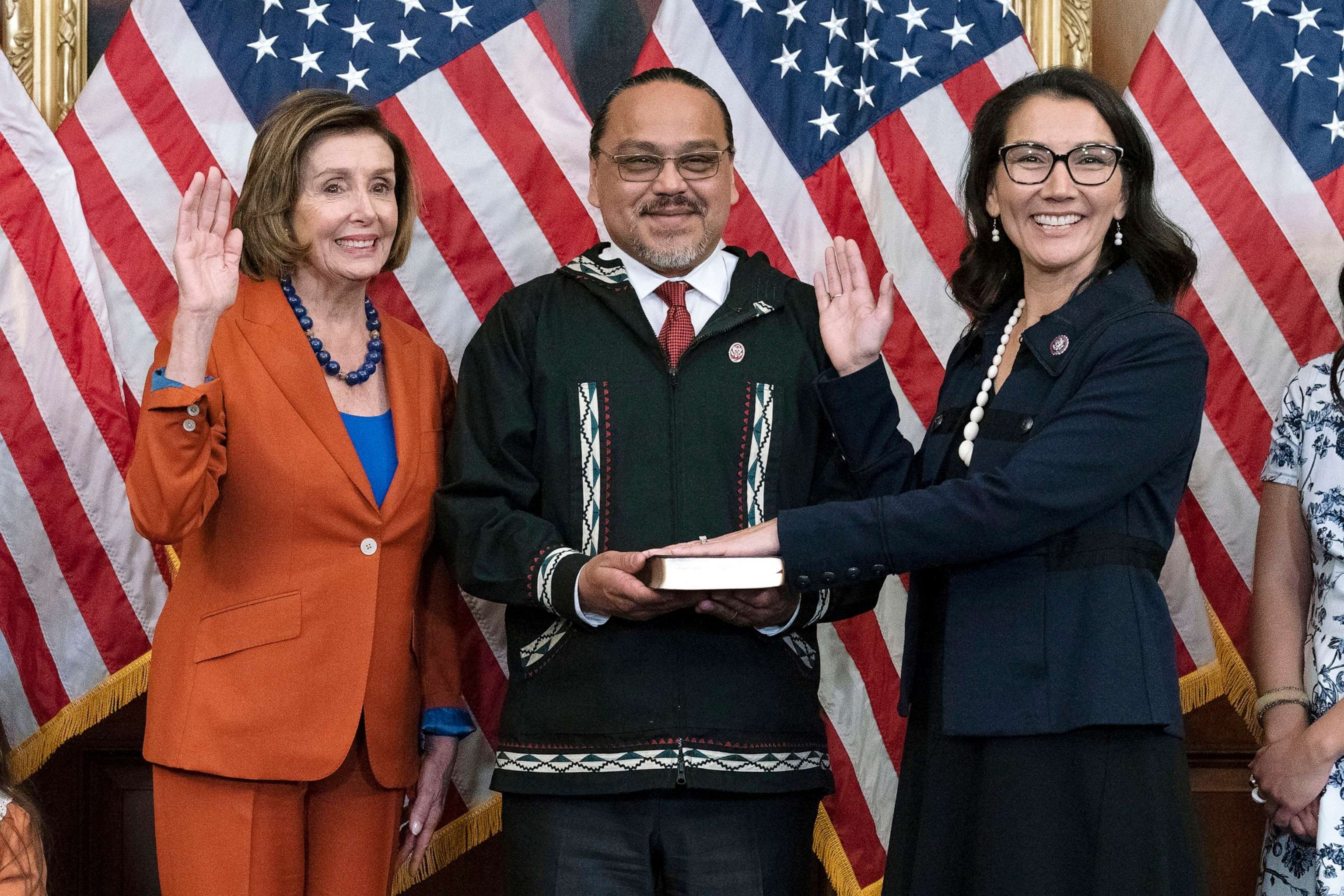 PHOTO: In this Sept. 13, 2022, file photo, Speaker of the House Nancy Pelosi administers the House oath of office to Rep. Mary Peltola, standing next to her husband Eugene "Buzzy" Peltola Jr., during a swearing-in on Capitol Hill in Washington, D.C.