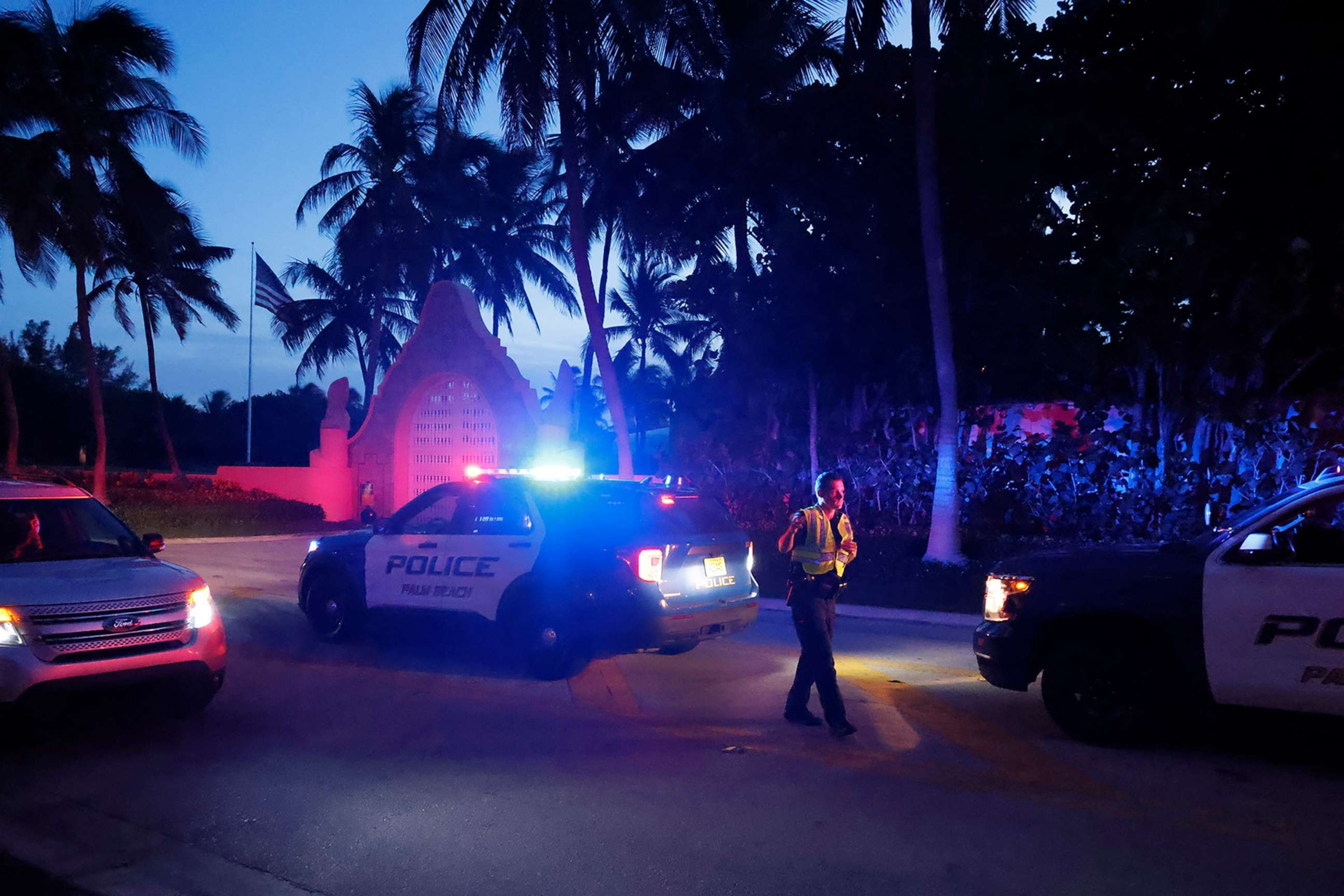 PHOTO: Police direct traffic outside an entrance to former President Donald Trump's Mar-a-Lago estate, Aug. 8, 2022, in Palm Beach, Fla.