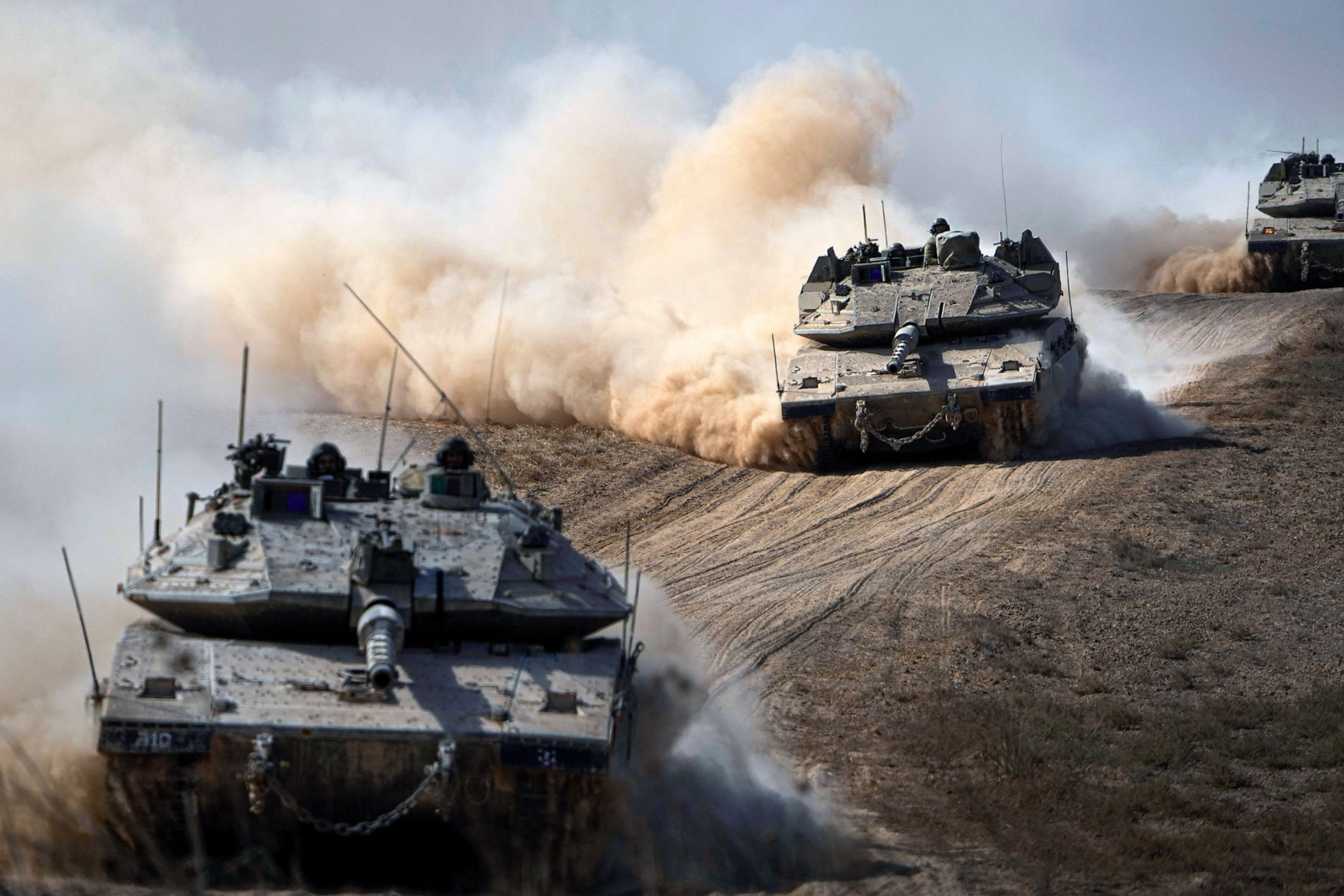PHOTO: Israeli tanks head towards the Gaza Strip border in southern Israel, Oct.13, 2023.