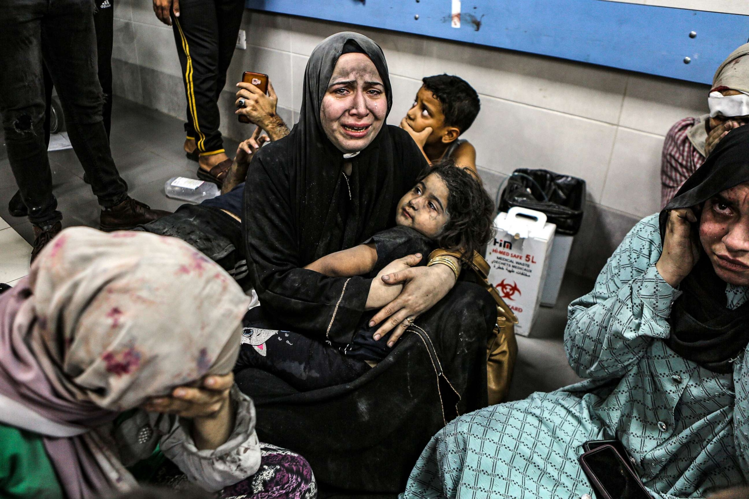 PHOTO: Injured Palestinians lay at the al-Shifa hospital, following airstrikes, in Gaza City, central Gaza Strip, Oct. 17, 2023.