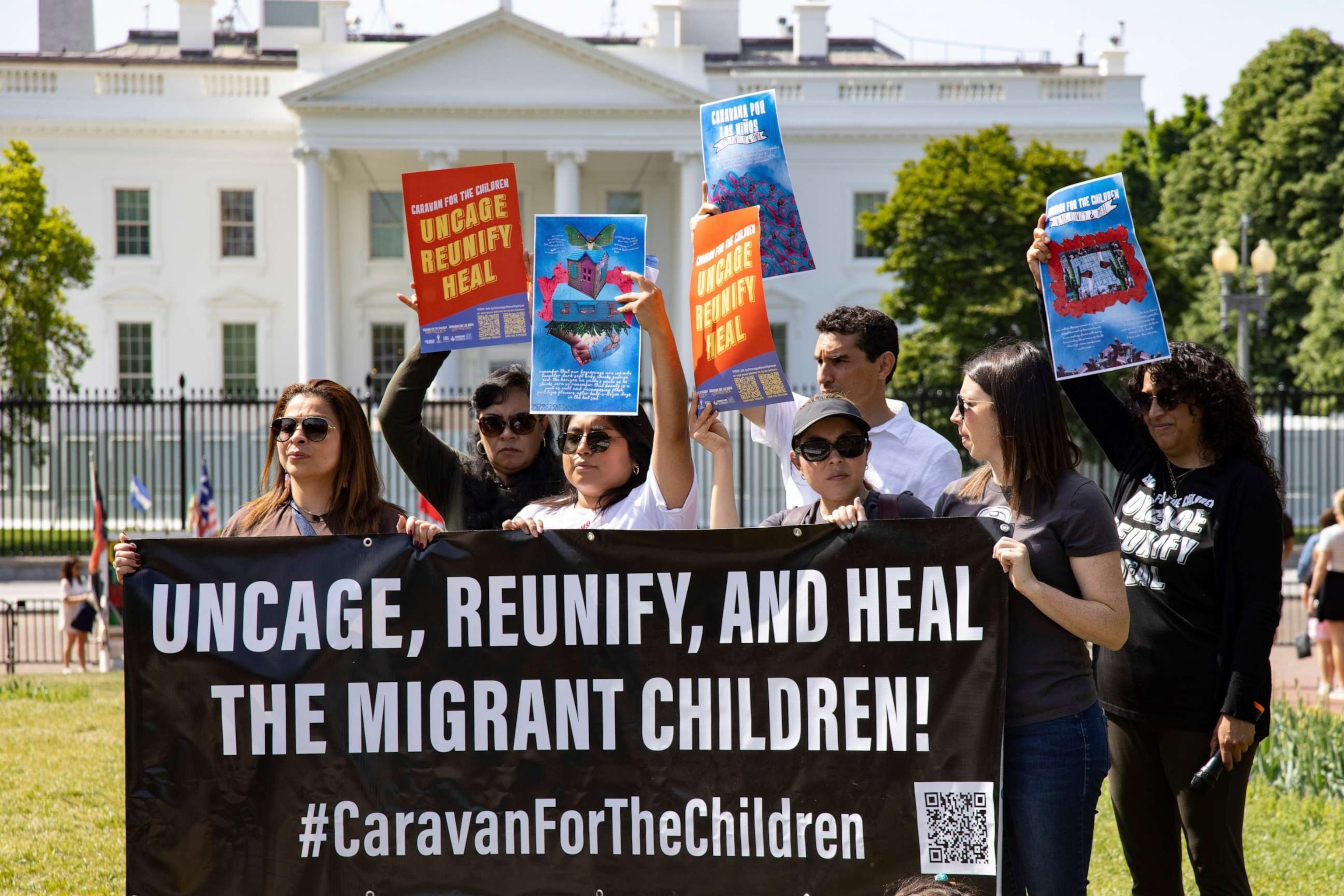 PHOTO: People attend a Caravan for The Children rally at Lafayette Park in front of the White House on May 2, 2022.