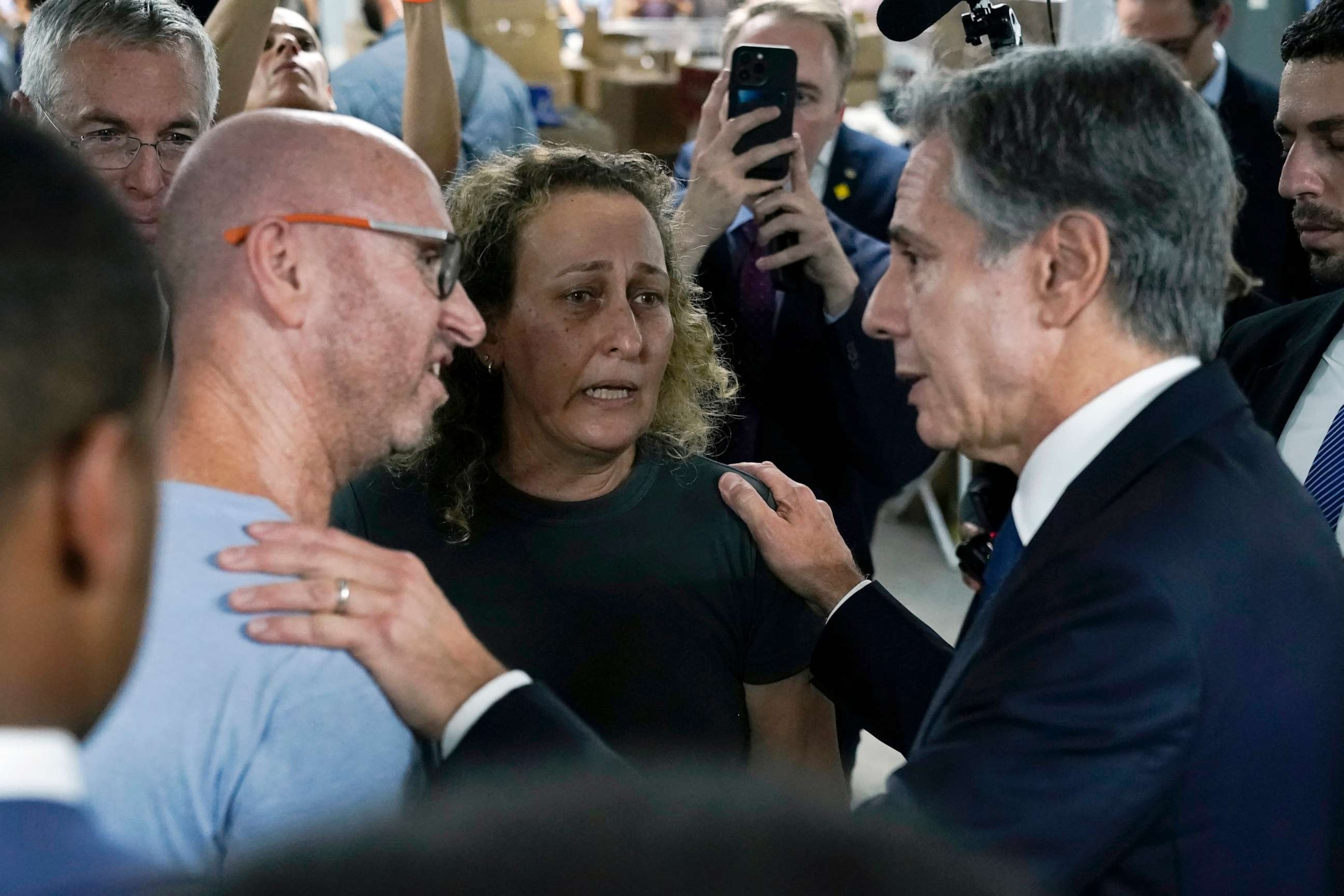 PHOTO: U.S. Secretary of State Antony Blinken speaks with people as he visits a donation center for victims of the Hamas terror attacks, Oct. 12, 2023, in Tel Aviv.